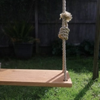 pom pom wooden swing